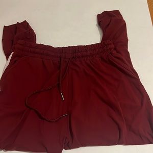 Woman, maroon, joggers